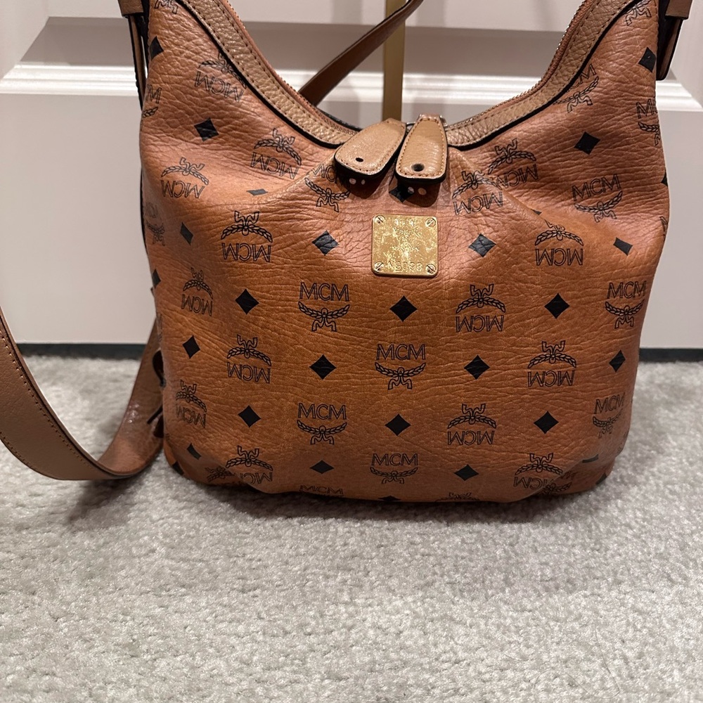 MCM Brown Shoulder Bag with Monogram Print and Gold-Tone Clasp hobo crossbody
